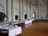 22 tables laid in dining room